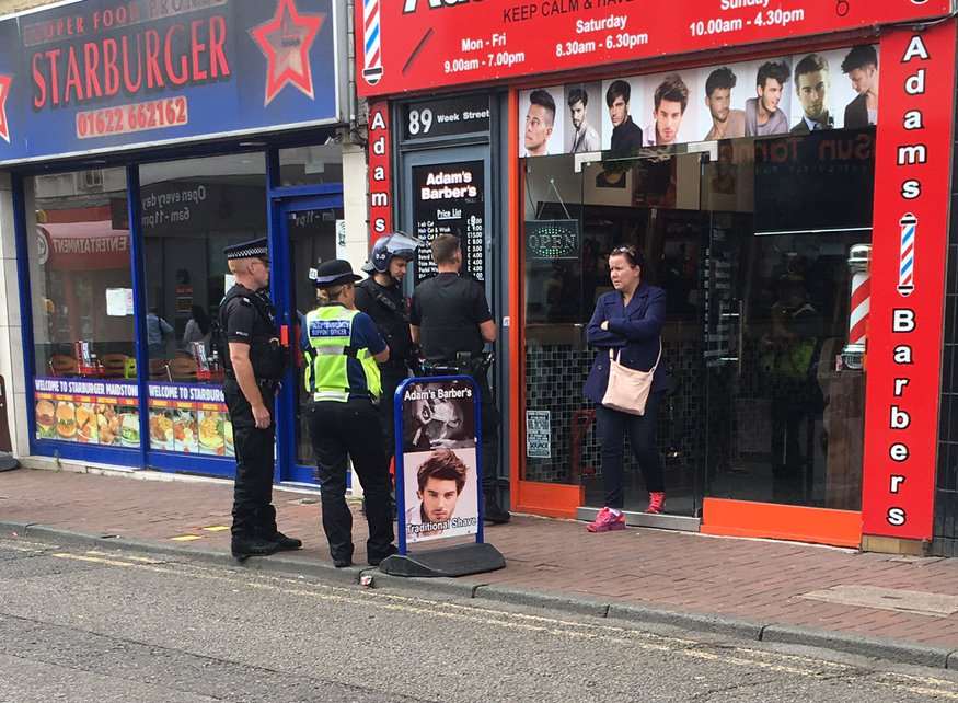 Police outside the barbers