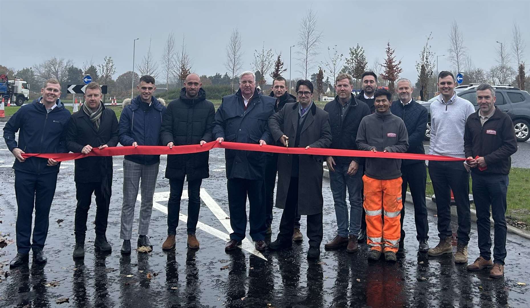 Councillors, developers and engineers celebrating the opening of the A20 Coldharbour Roundabout. Picture: KCC