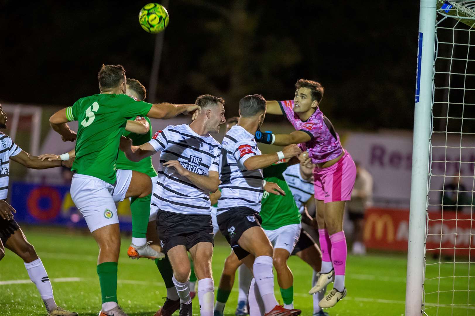 Margate goalkeeper Tom Wray in the thick of the action during the 2-2 draw at Ashford on Friday. Picture: Ian Scammell