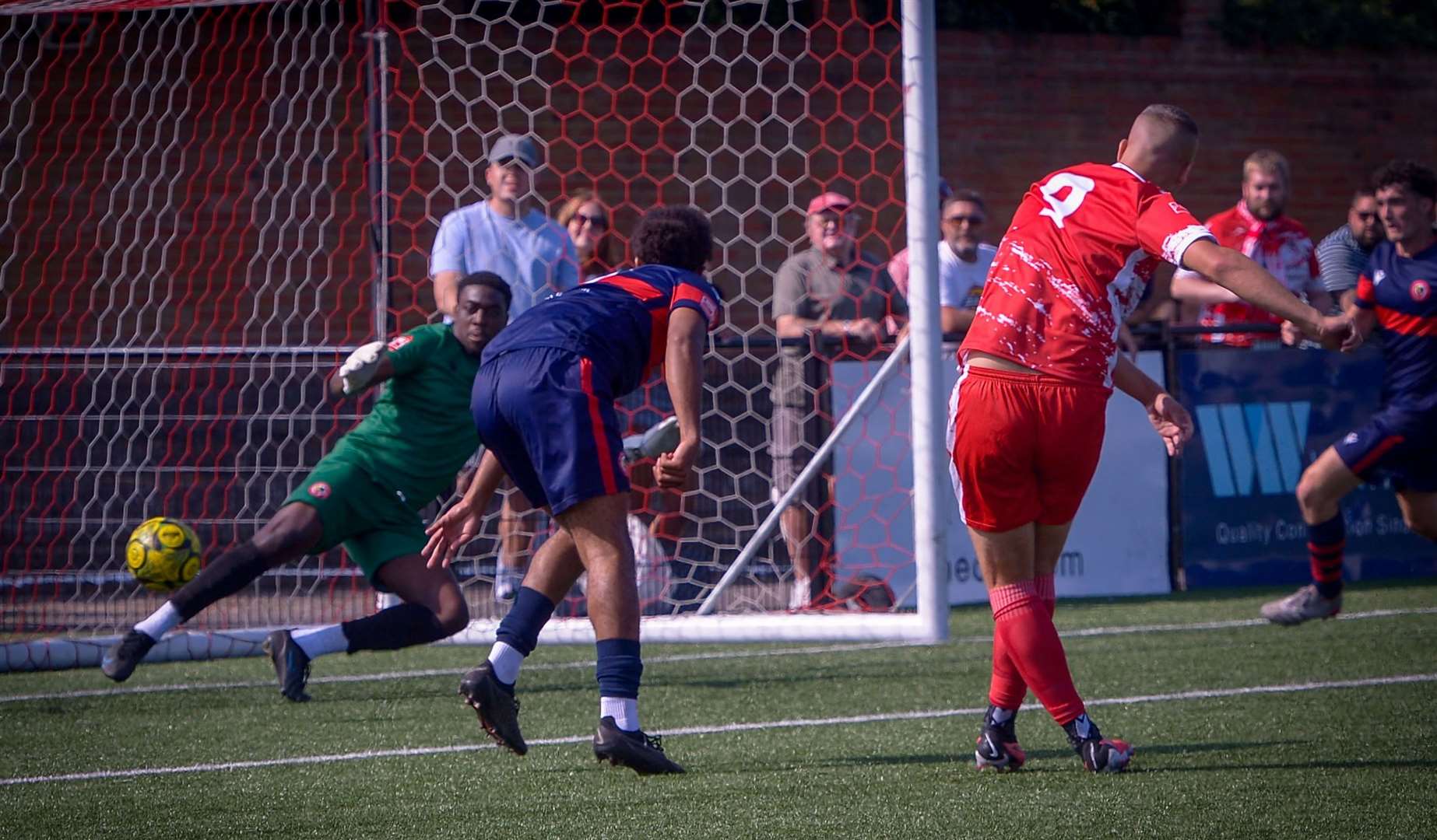 Ramsgate’s Joe Taylor sweeps home one of his four goals in their FA Cup preliminary round win over Southall on Saturday. Picture: Stuart Watson