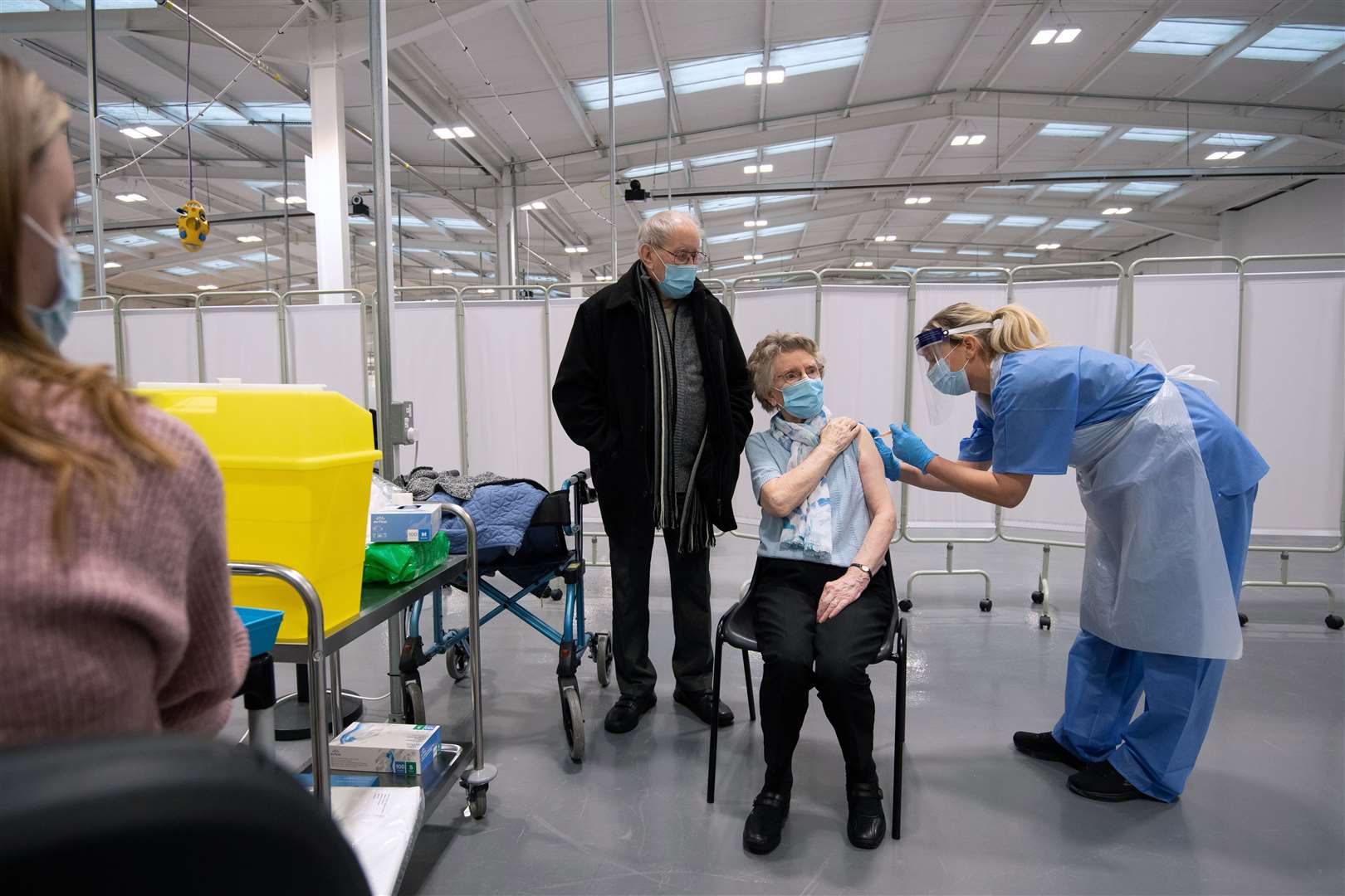 Mrs Holland receives her injection of the AstraZeneca coronavirus vaccine (Joe Giddens/PA)