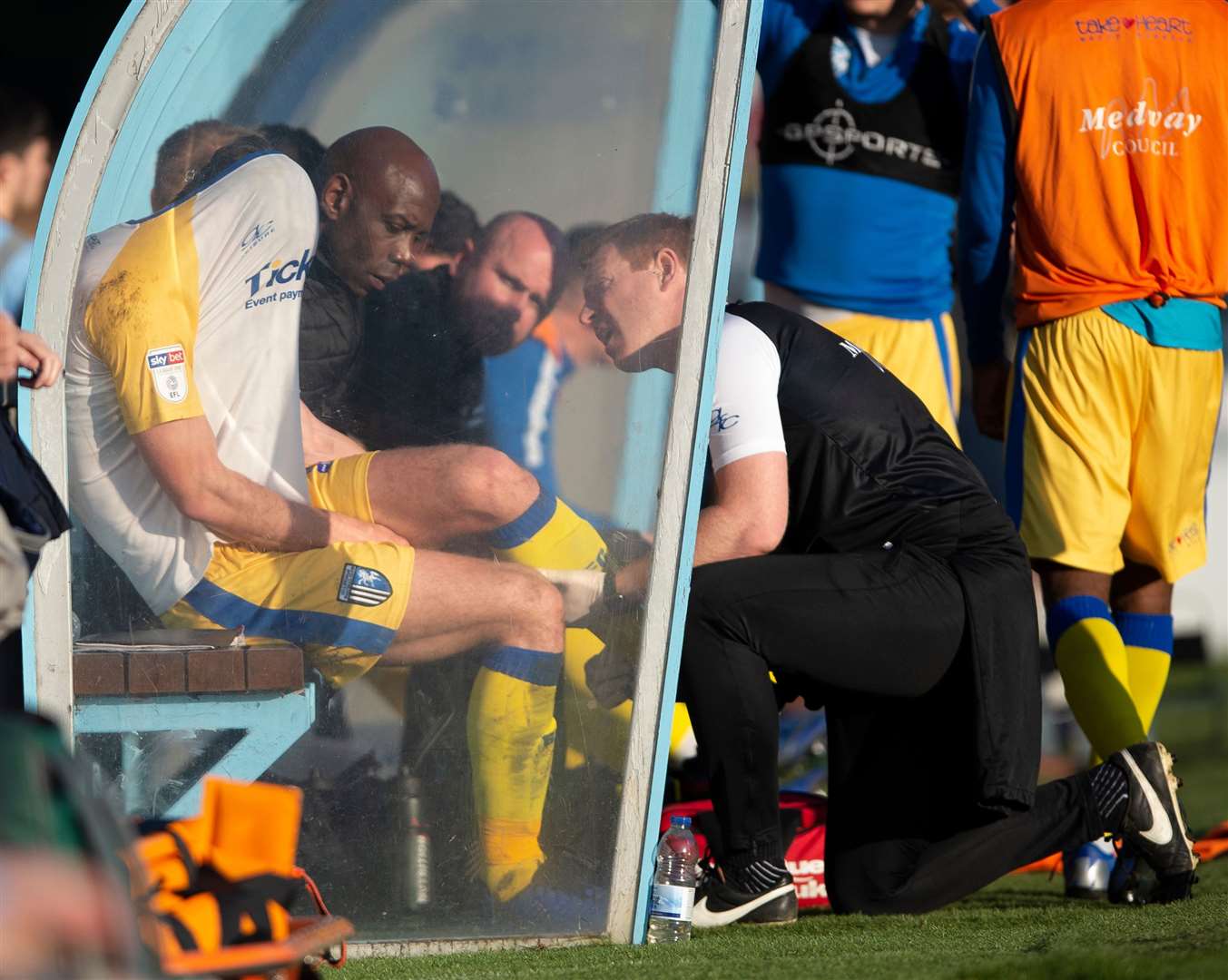 Billy Bingham hides his face in his shirt after an injury at AFC Wimbledon but he is back in training Picture: Ady Kerry