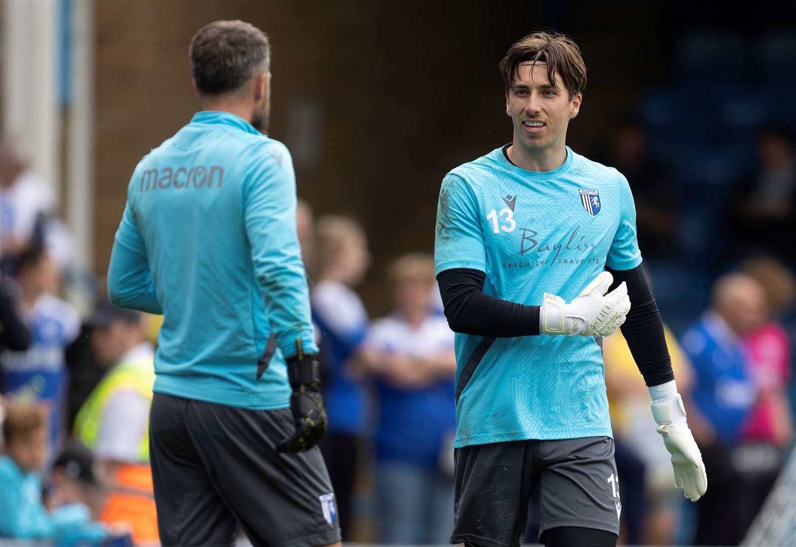 Gillingham's new signing Luca Ashby-Hammond was on the bench against Chesterfield on Saturday - supporting Glenn Morris Picture: @Julian_KPI