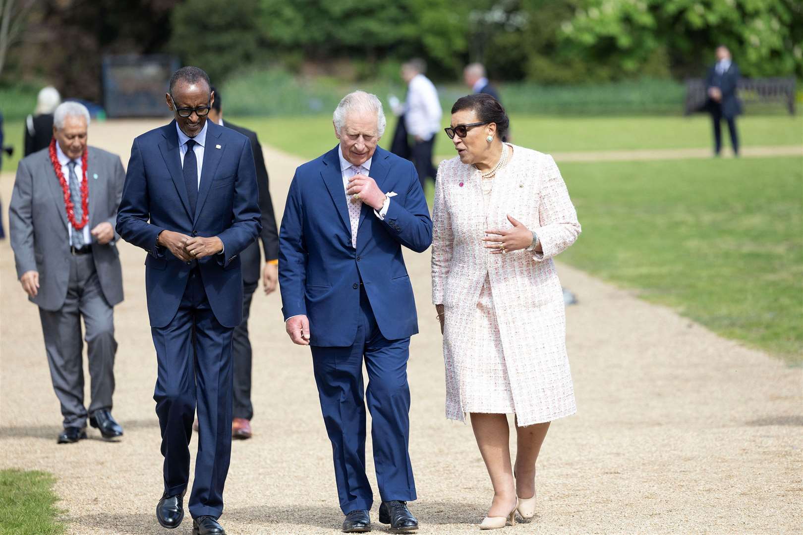 The King with Commonwealth secretary-general Baroness Scotland and the president of Rwanda, Paul Kagame (Anna Gordon/PA)