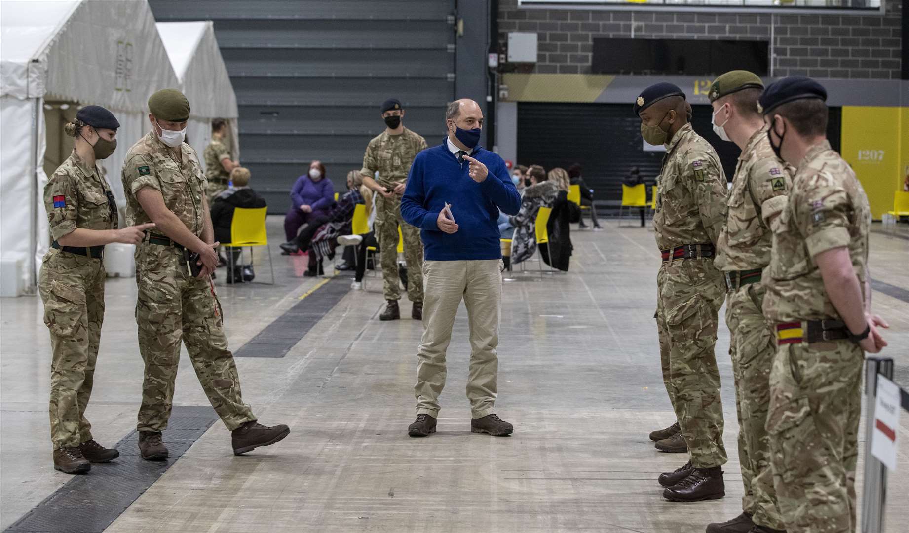 Ben Wallace talks to soldiers at the testing centre (Peter Byrne/PA)