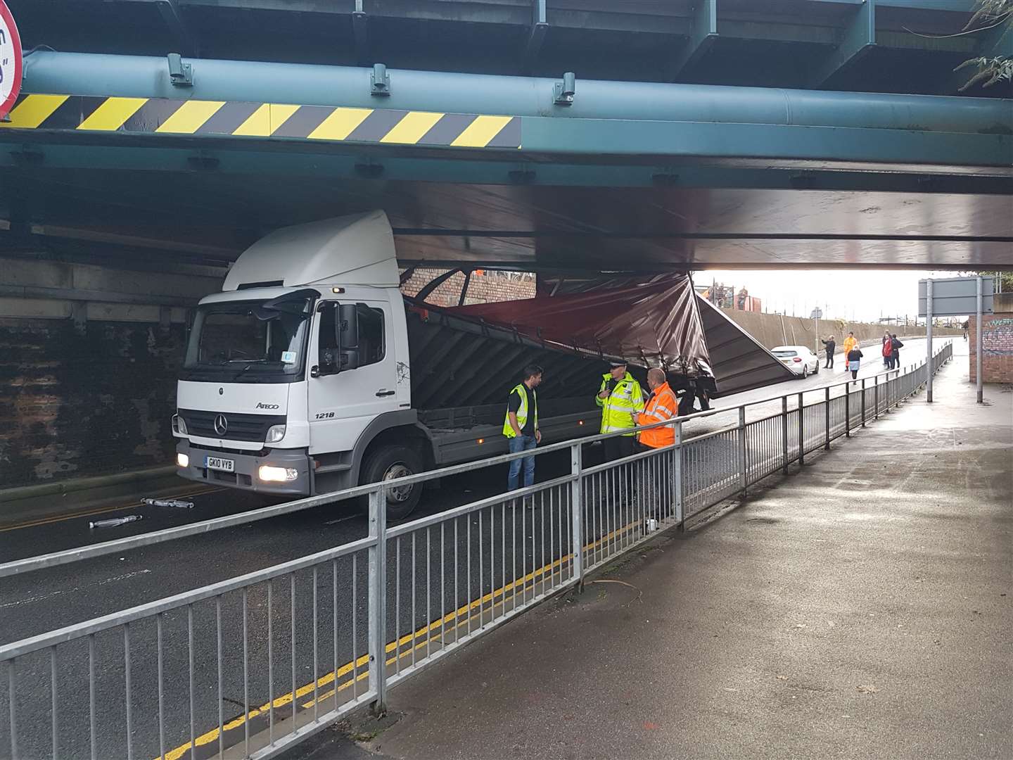 The driver of this lorry has been given a summons after hitting the Newtown Road bridge, .