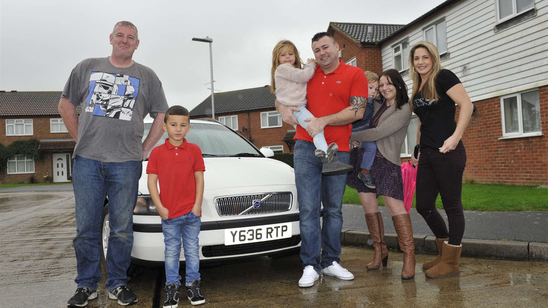 Marc Collins and Mark Rogers with family members