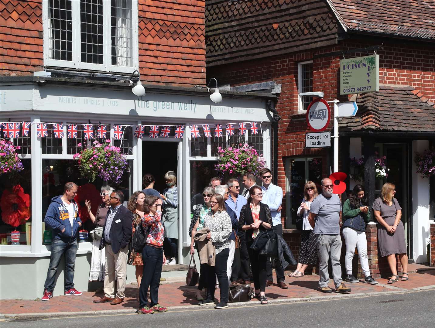 Local residents gather in Ditchling, East Sussex (Gareth Fuller/PA)