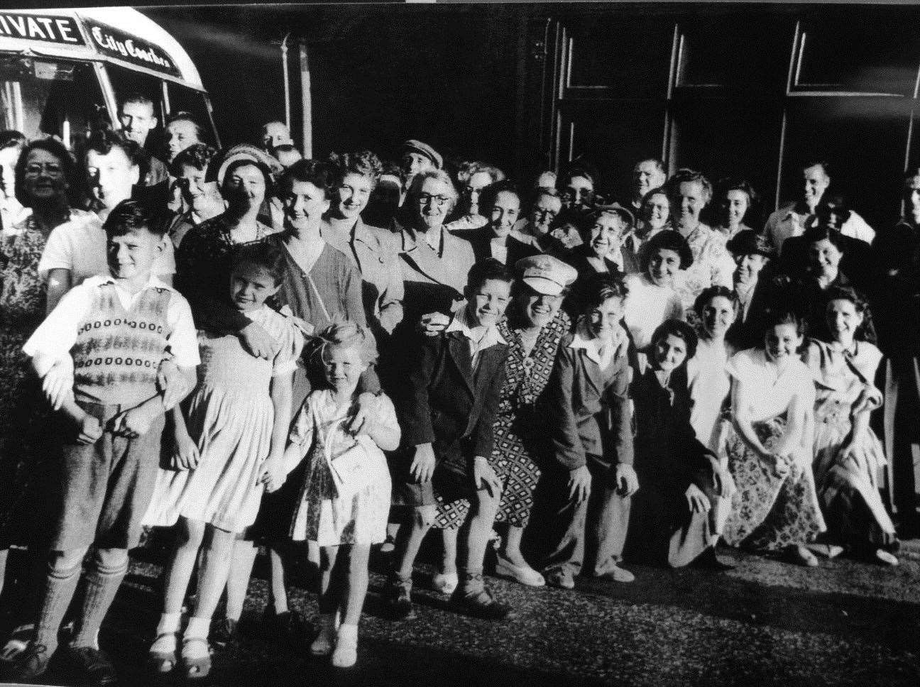 Residents of Blue Town, Sheerness, get set for a coach trip in the 1950s. Picture: Bel Austin