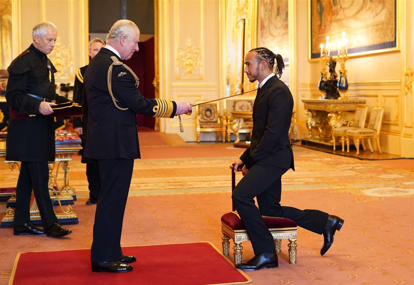 Sir Lewis Hamilton was made a Knight Bachelor by the Prince of Wales at Windsor Castle (Dominic Lipinski/PA)