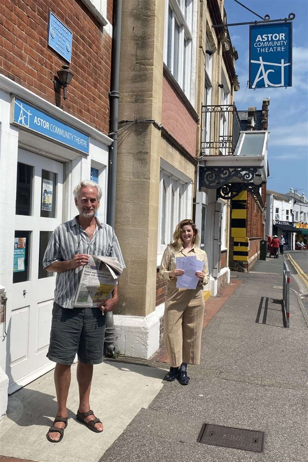 Amber Bytheway with Astor Theatre creative director James Tillitt with the petition asking the council to support the venue.