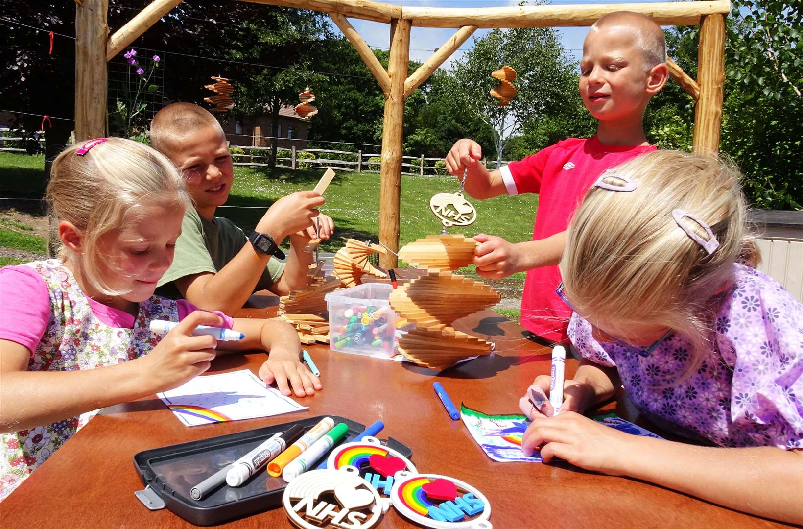 Children from the Kleiner family of Nonington helping make the spinners in aid of the NHS