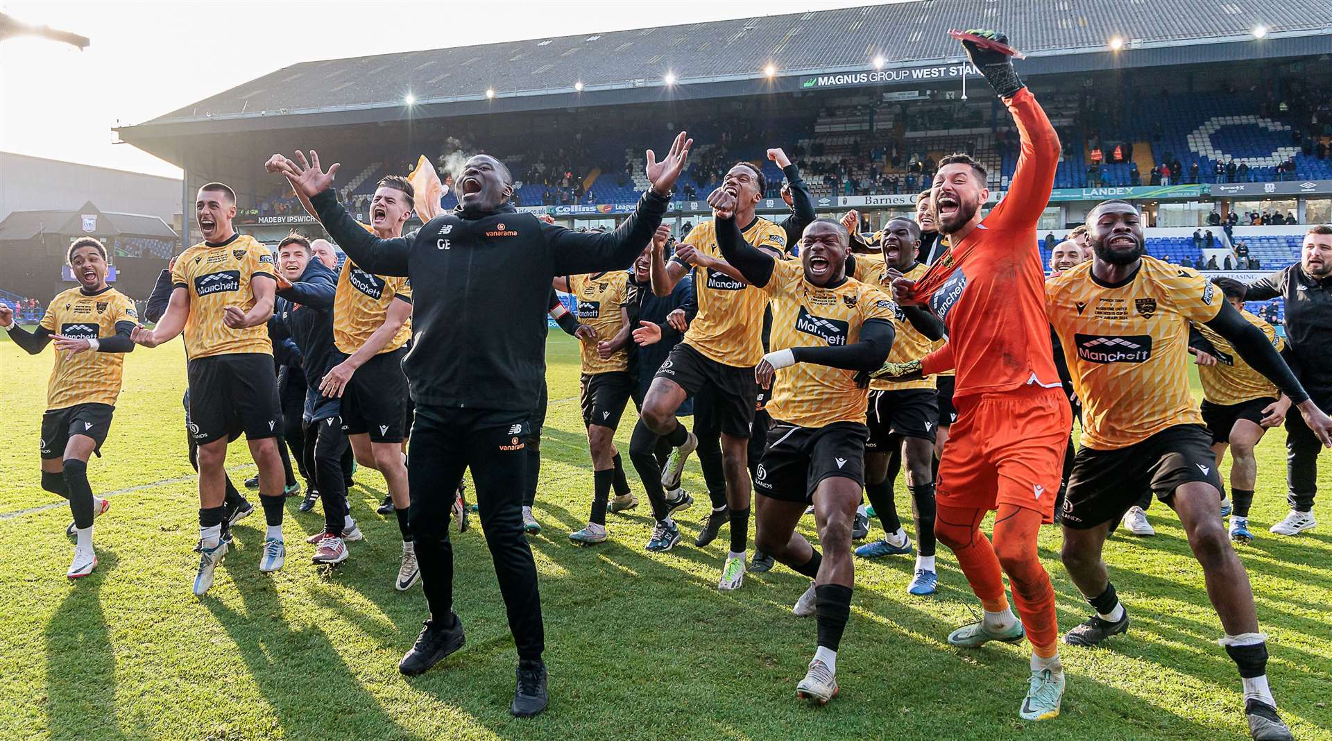 Maidstone boss George Elokobi celebrates Stones' FA Cup fourth-round victory at Ipswich. Picture: Helen Cooper