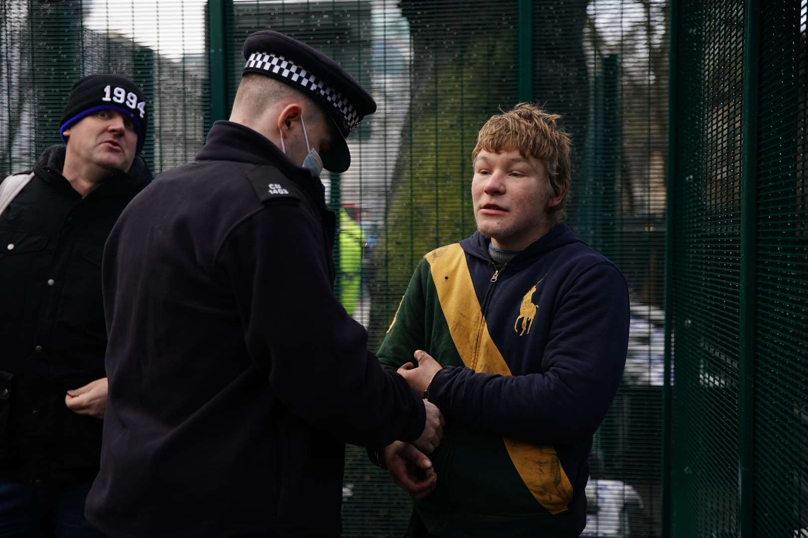 Police officers have made at least seven arrests (Aaron Chown/PA)