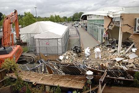 The raid at Asda in Greenhithe caused £120,000 worth of damage and a cash machine containing £160,000 was stolen