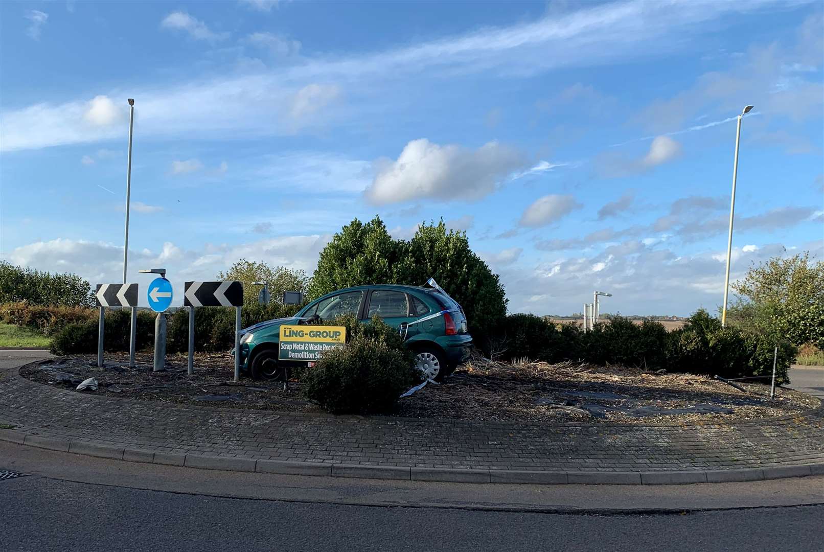 The Citroen car is covered in police tape