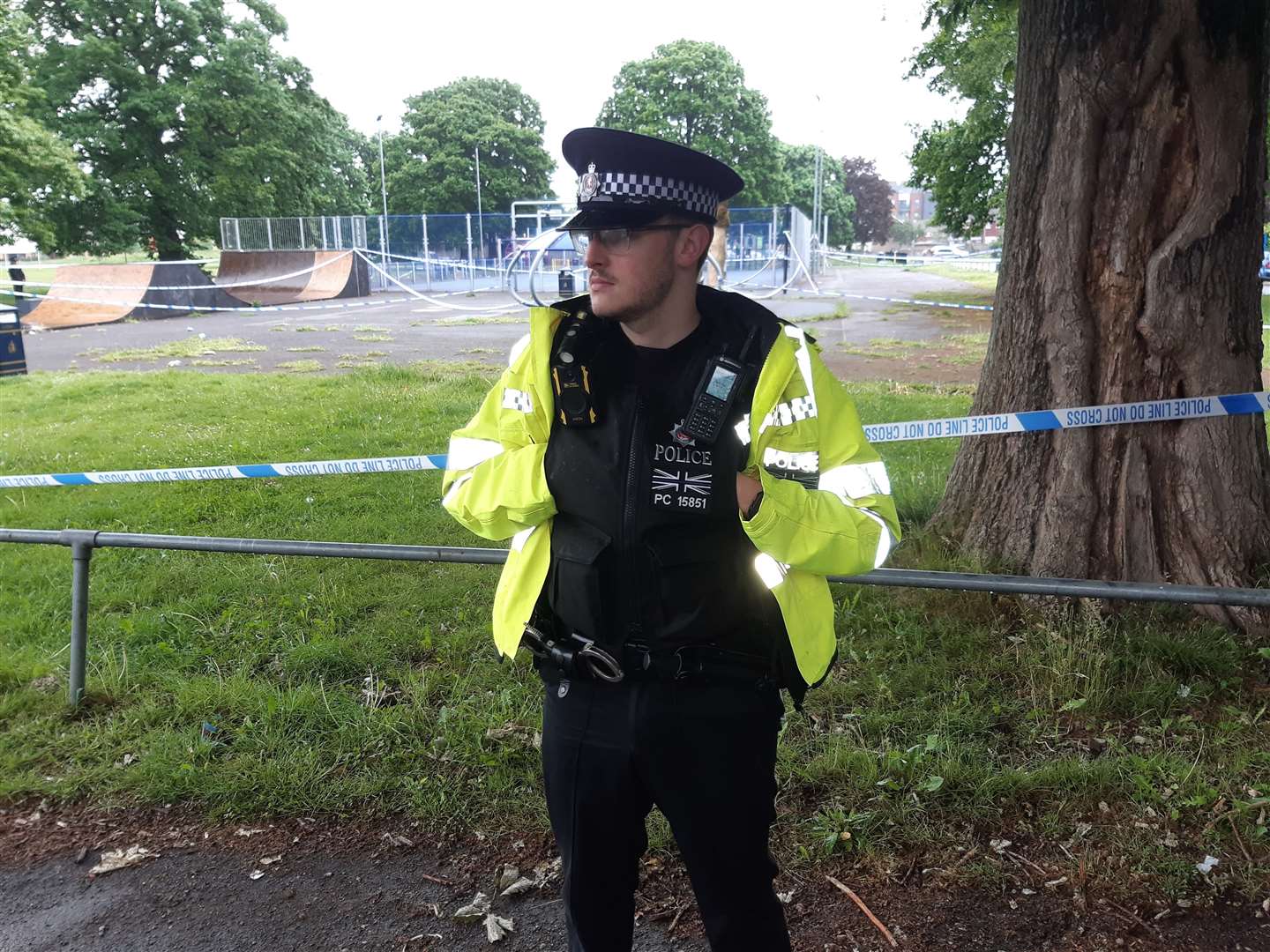 An officer stands guard over the scene of a stabbing in Park Wood, Maidstone