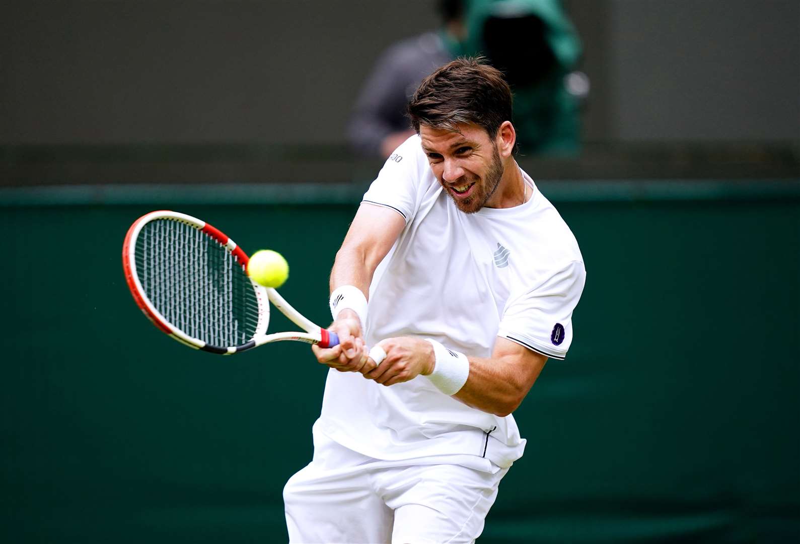 Cameron Norrie in action during his fourth round match against Tommy Paul on day seven of the Championships (Aaron Chown/PA)