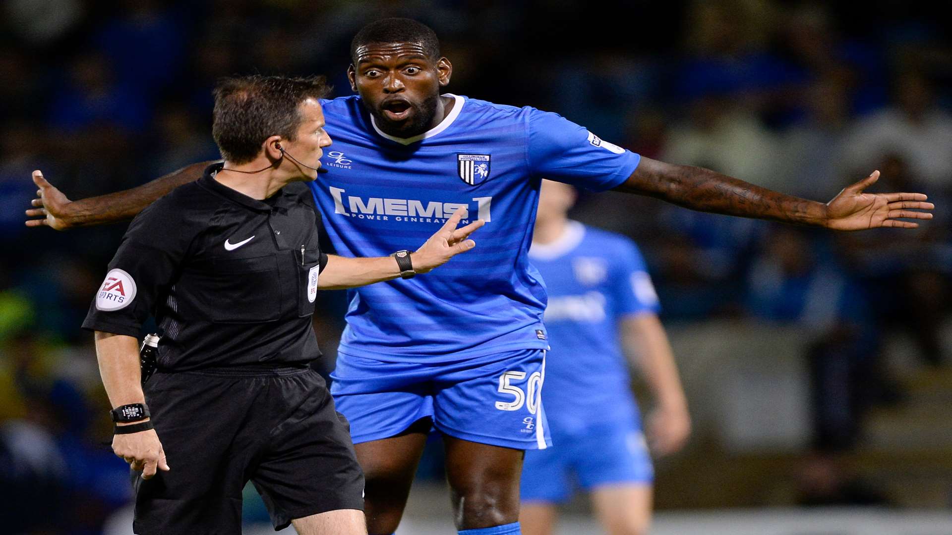 Jay Emmanuel-Thomas meets referee Keith Stroud. Picture: Ady Kerry