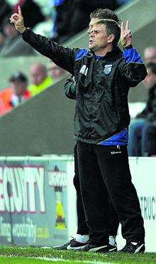 Gillingham boss Andy Hessenthaler directs his players at Morecambe