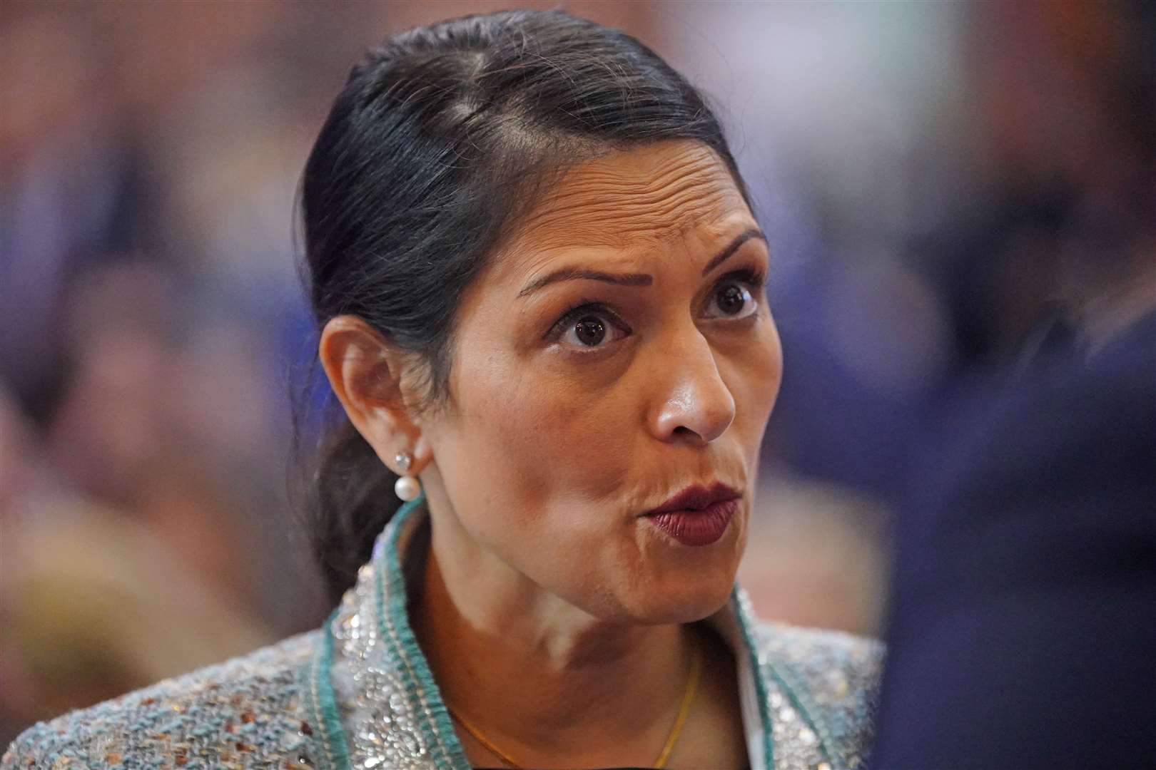 Dame Priti Patel said the Government’s asylum accommodation system is in need of reform (Victoria Jones/PA Images)