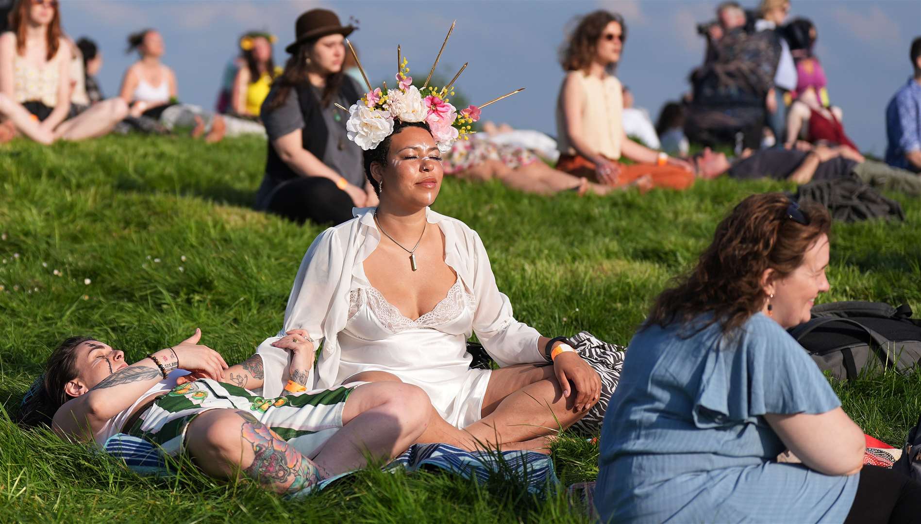 Thousands of people gathered for the Bealtaine Fire Festival at the Hill of Uisneach in Co Westmeath in May (Niall Carson/PA)