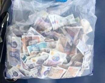 Some of the cash seized in the operation