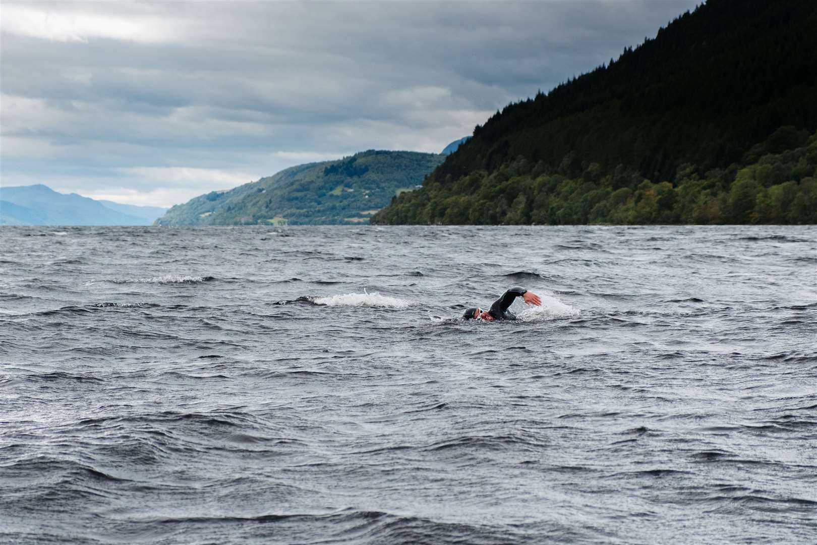 Extreme adventurer Ross Edgley has broken the record for the longest ever open water swim in Loch Ness (Jonty Storey/PA)