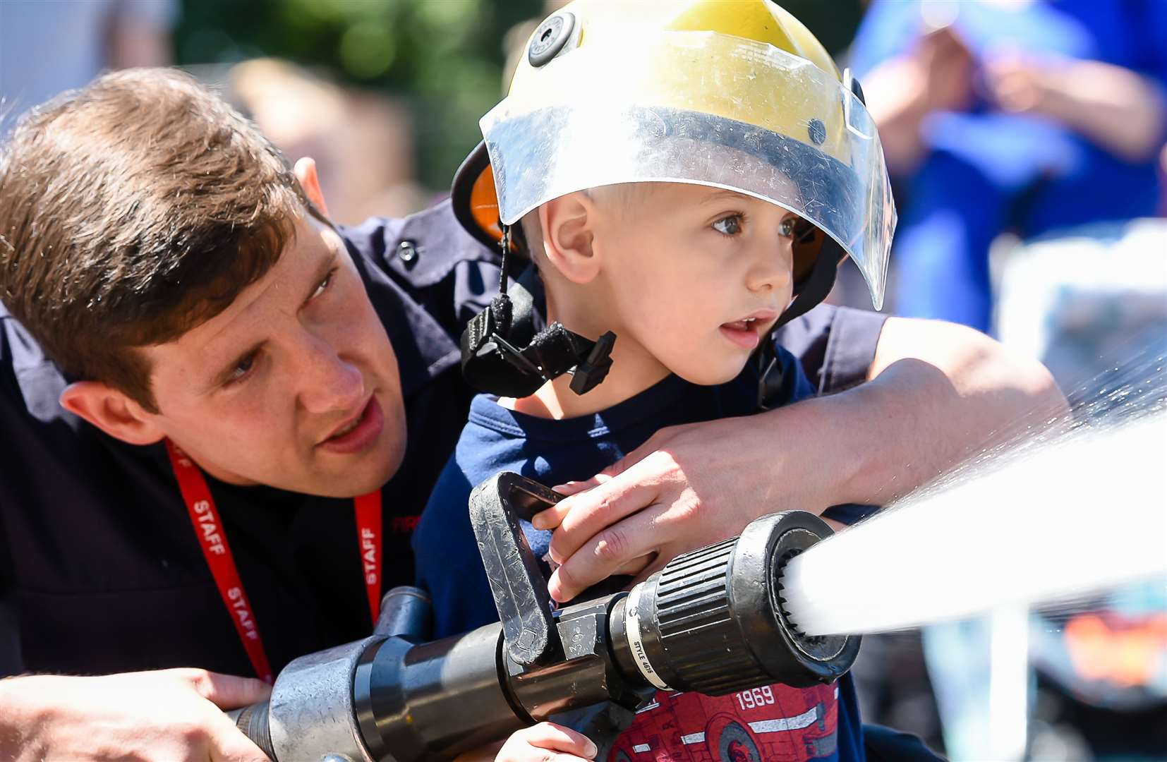 Oakley Crittenden from Chatham is shown how to firefight at the Open Day at Ramsgate Fire Station Picture: Alan Langley