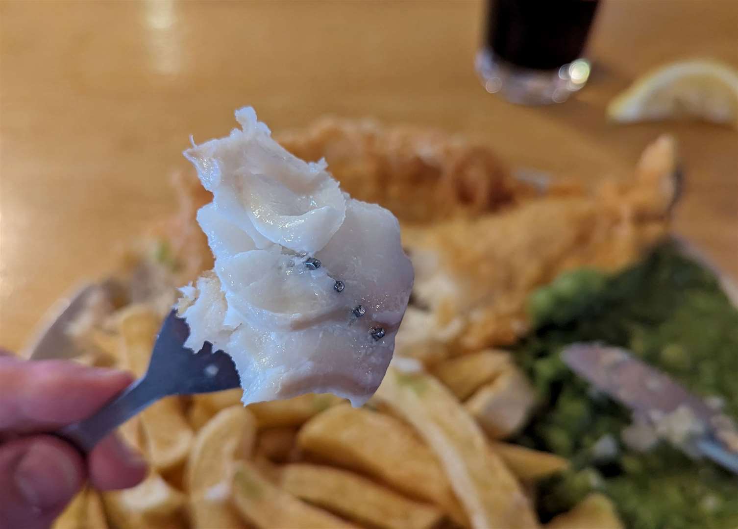 Juicy flakes of cod went down a treat – but our man was beaten by the batter and mound of chips