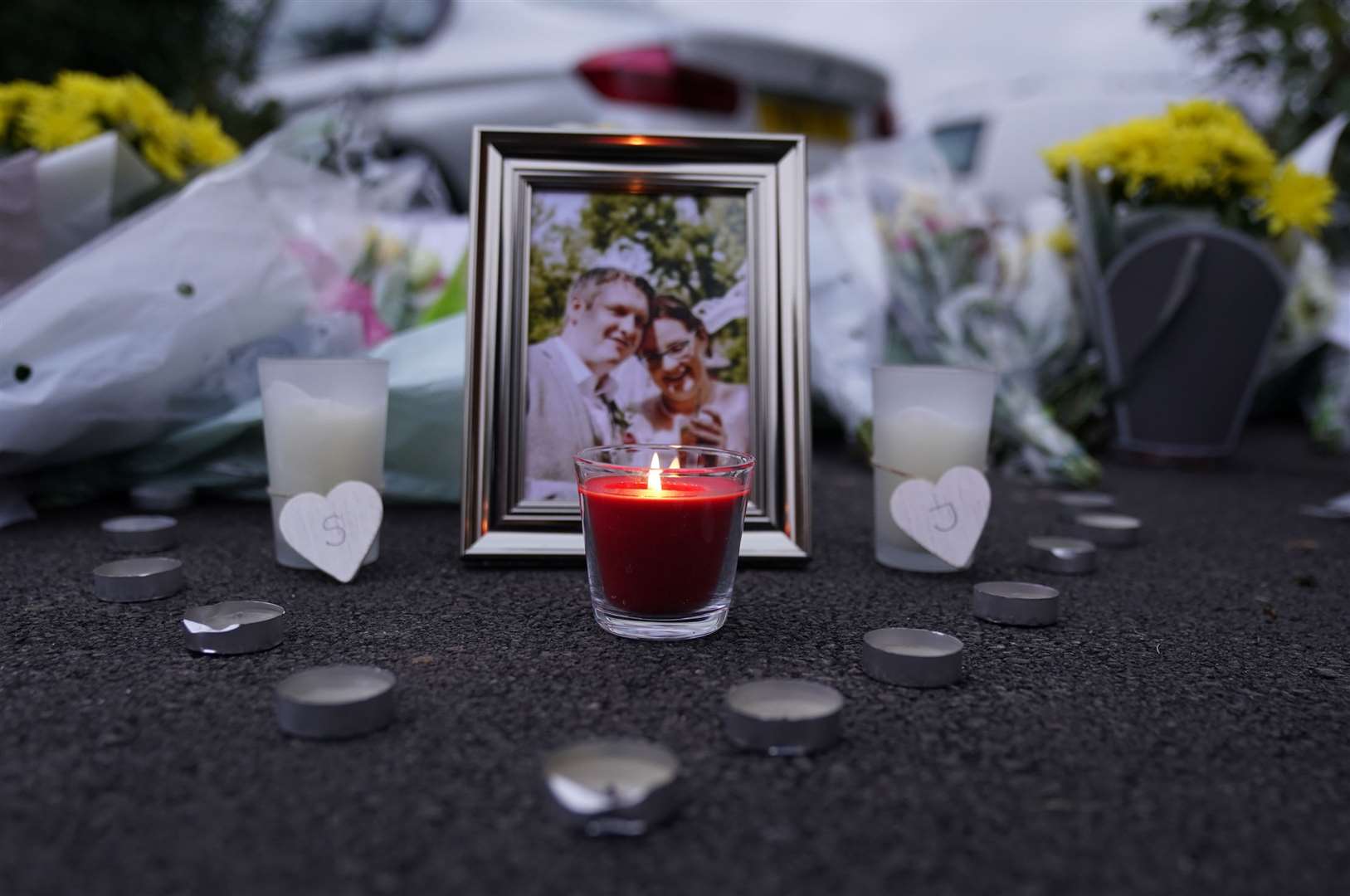 Tributes laid for Stephen and Jennifer Chapple in Norton Fitzwarren (Andrew Matthews/PA)