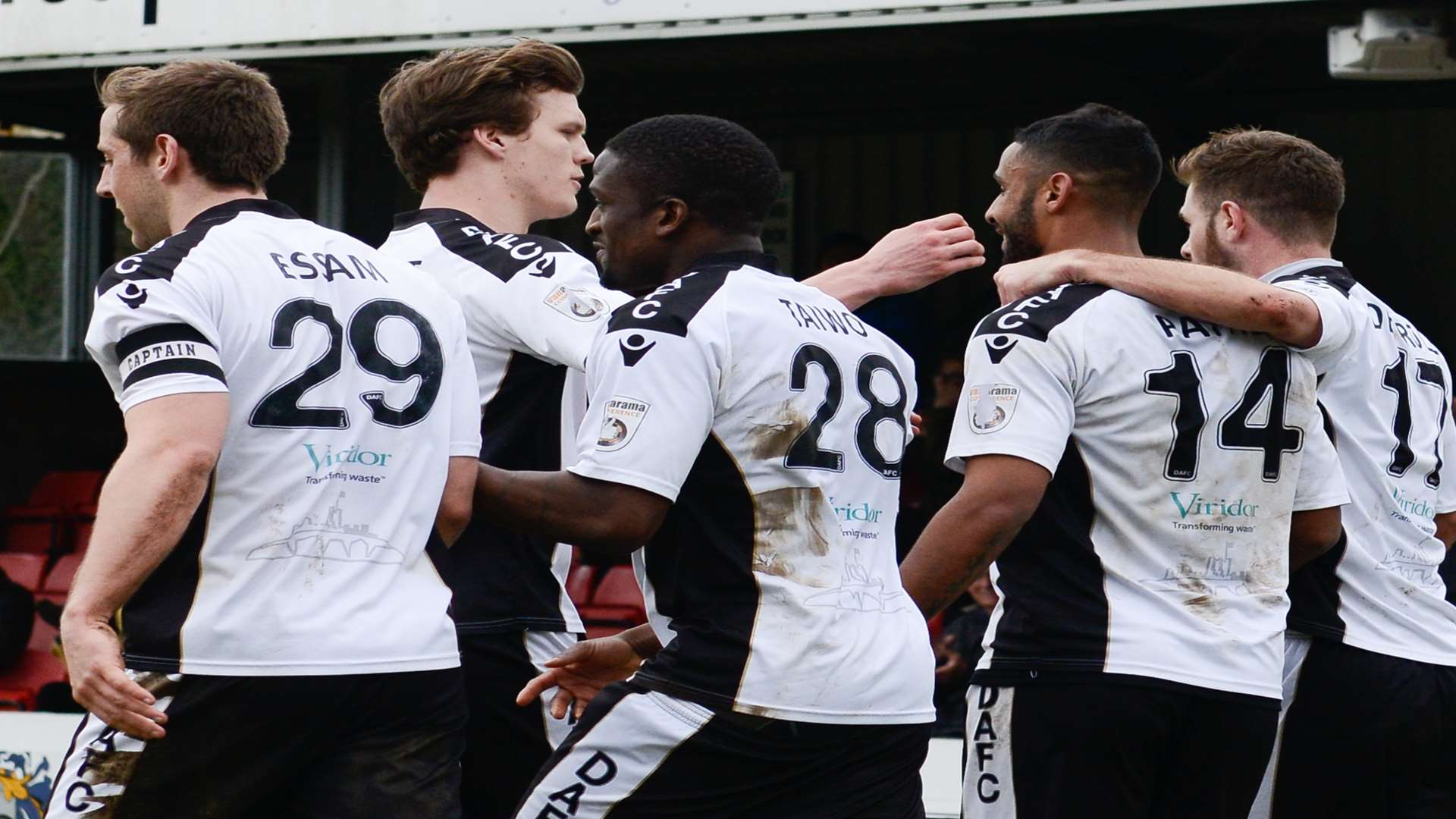 Dover celebrate after Stefan Payne's match-winning penalty