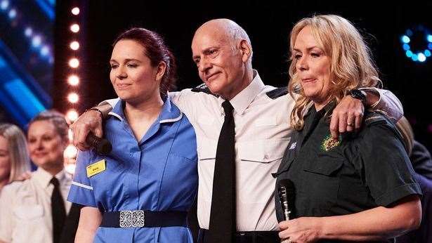 Emily Mann (left), pictured with Demi Georghiou (centre) and Rebecca Hunt (right), is among those in the choir ( Image: ITV)