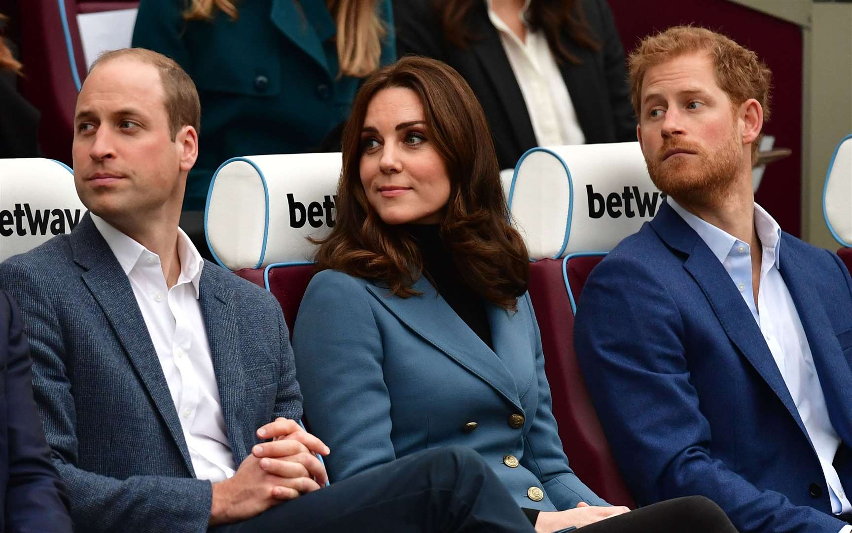 The Cambridges and Harry attending a graduation ceremony for 150 Coach Core apprentices in 2017 (Dominic Lipinski/PA)