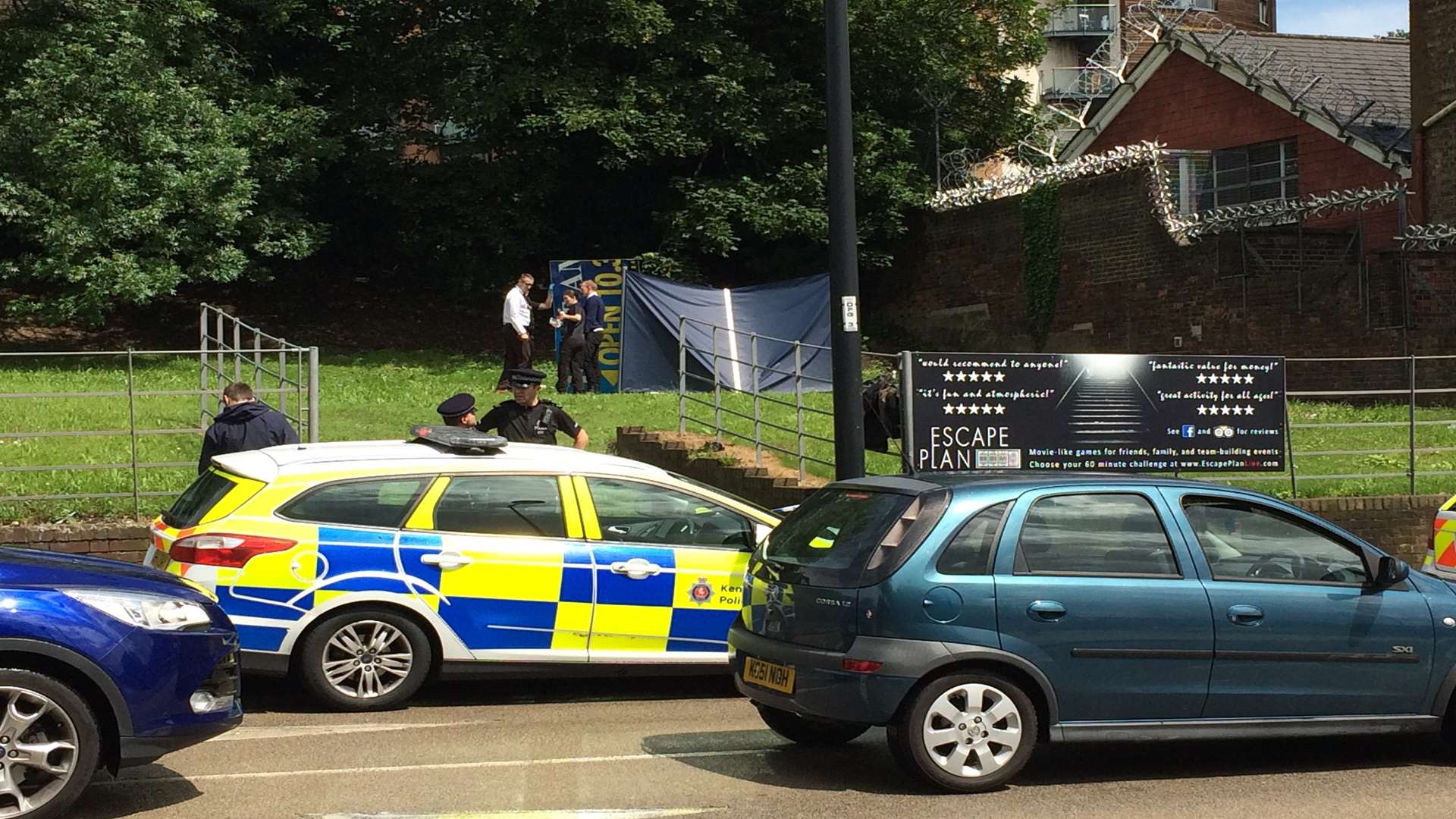 Police cars in Dock Road, Chatham, where Mr Paine's body was found