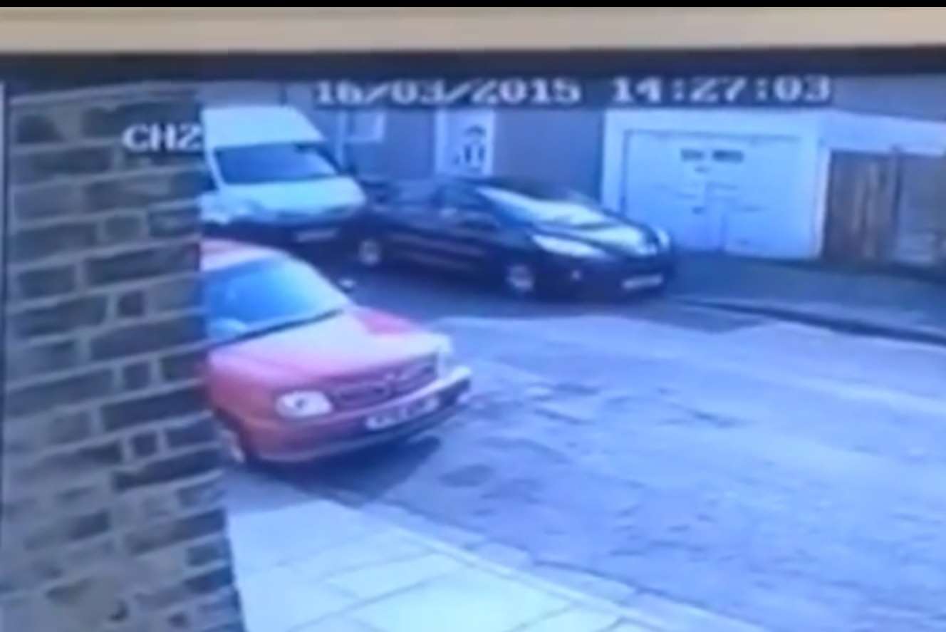 The van pulls up behind the car