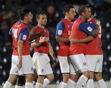 Gills celebrate their goal at Wycombe