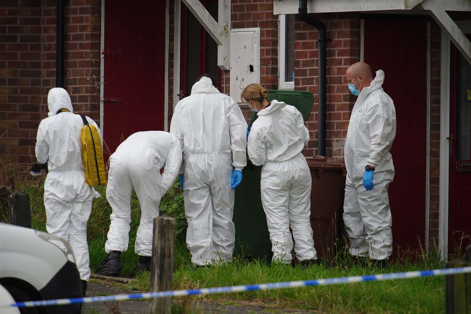 Forensic officers at the scene of the shootings in Plymouth (PA)