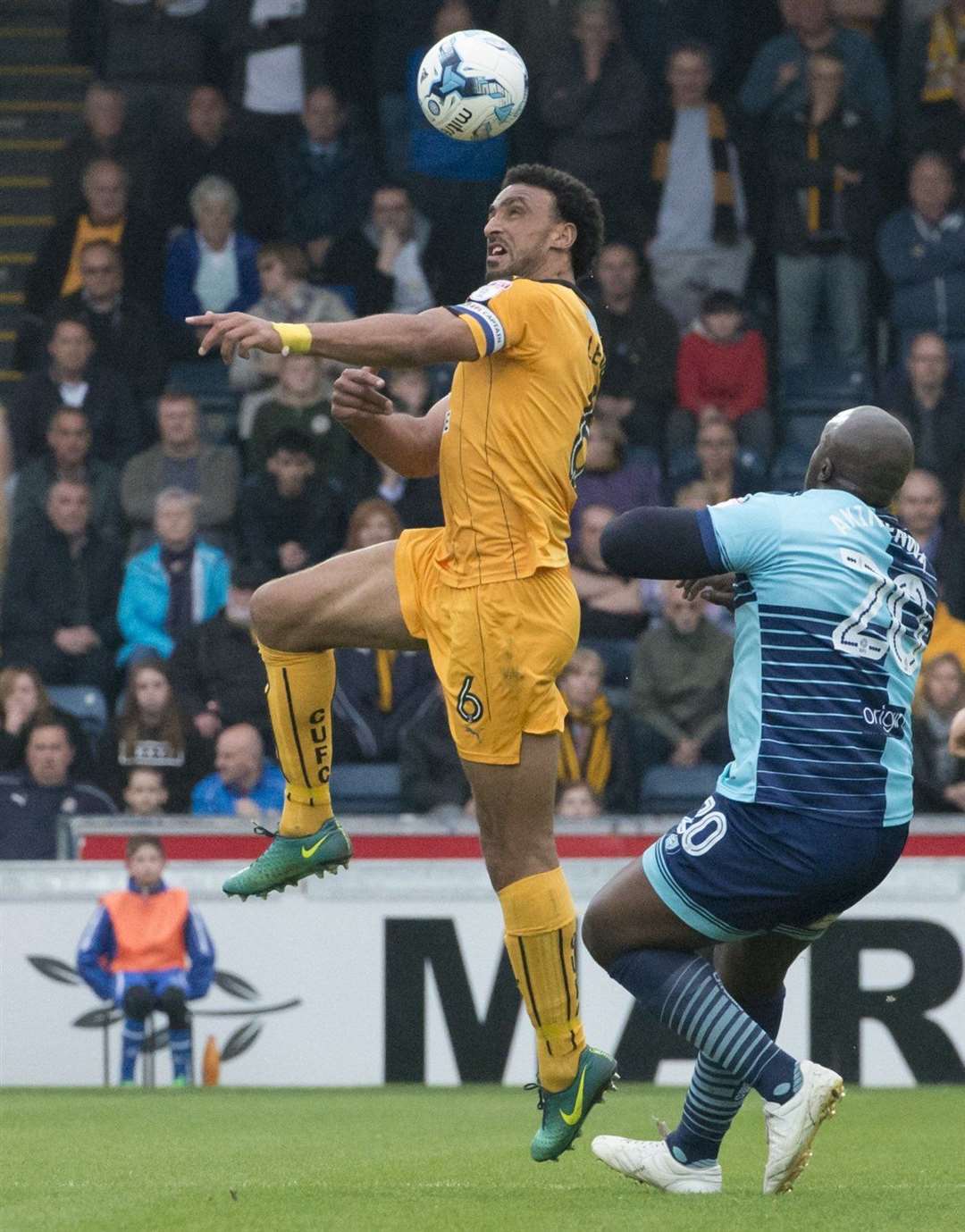 Former Gillingham player Adebayo Akinfenwa in action for Wycombe who will be playing in the second tier next season