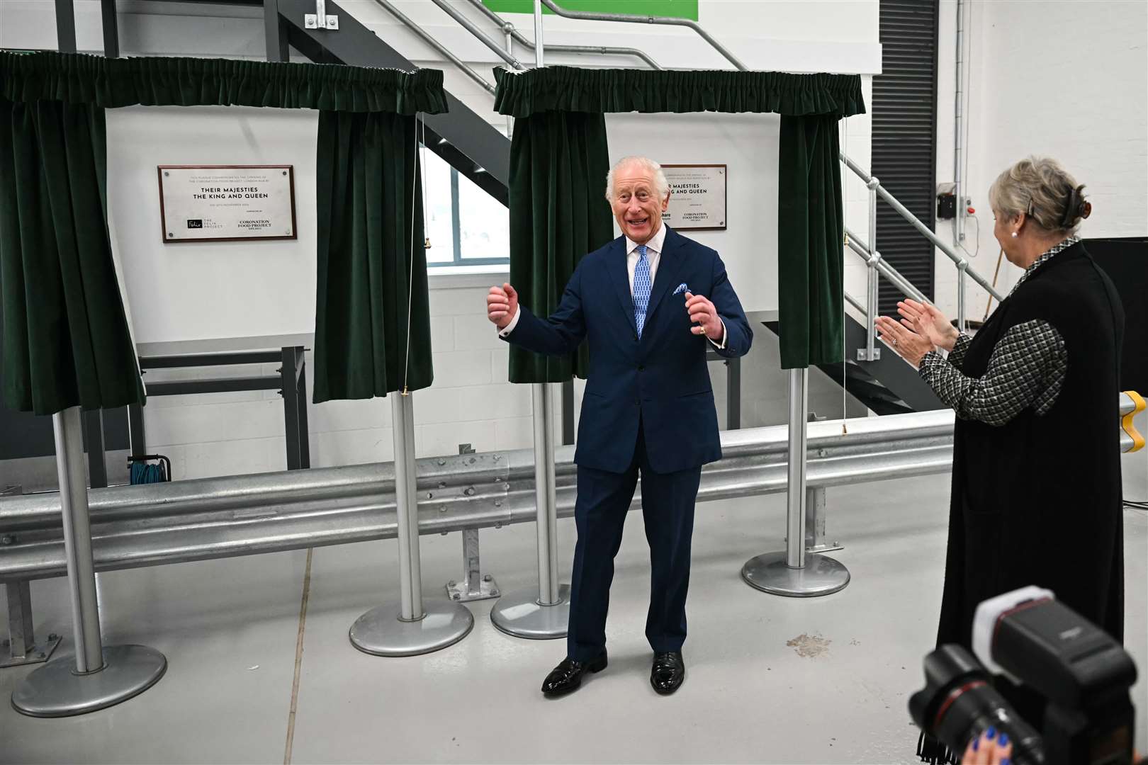 The King unveiled plaques marking the opening of the first two Coronation Food Project hubs, one in person in south-east London and the other virtually in Knowsley, Merseyside (Justin Tallis/PA)