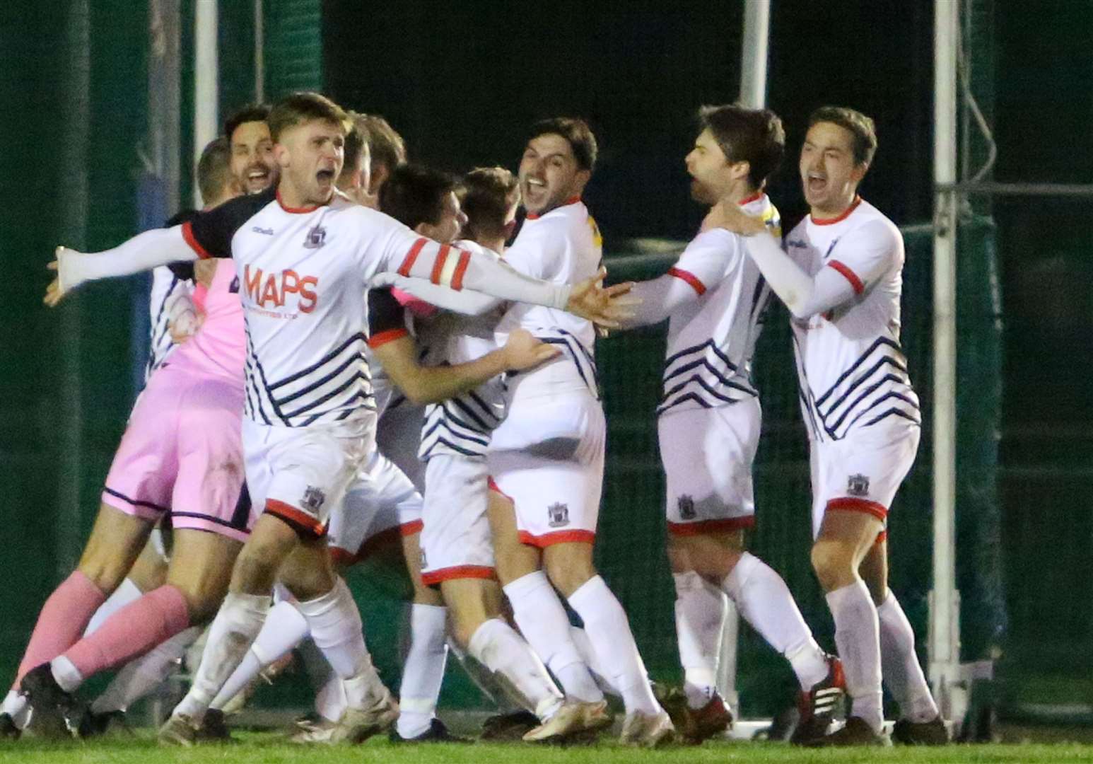 Deal Town's players celebrate winning the shoot-out. Picture: Paul Willmott