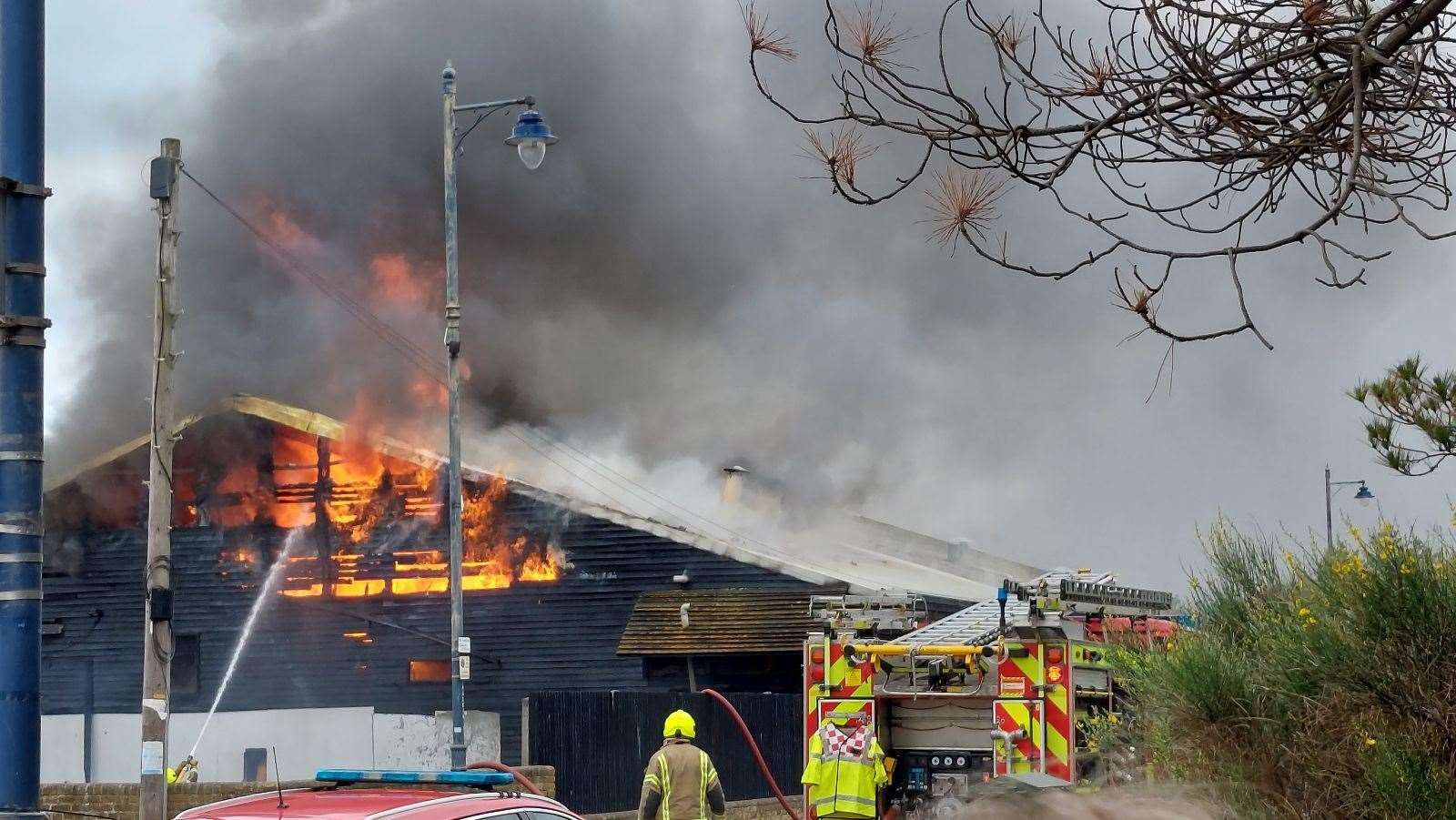 Flames pouring from the building