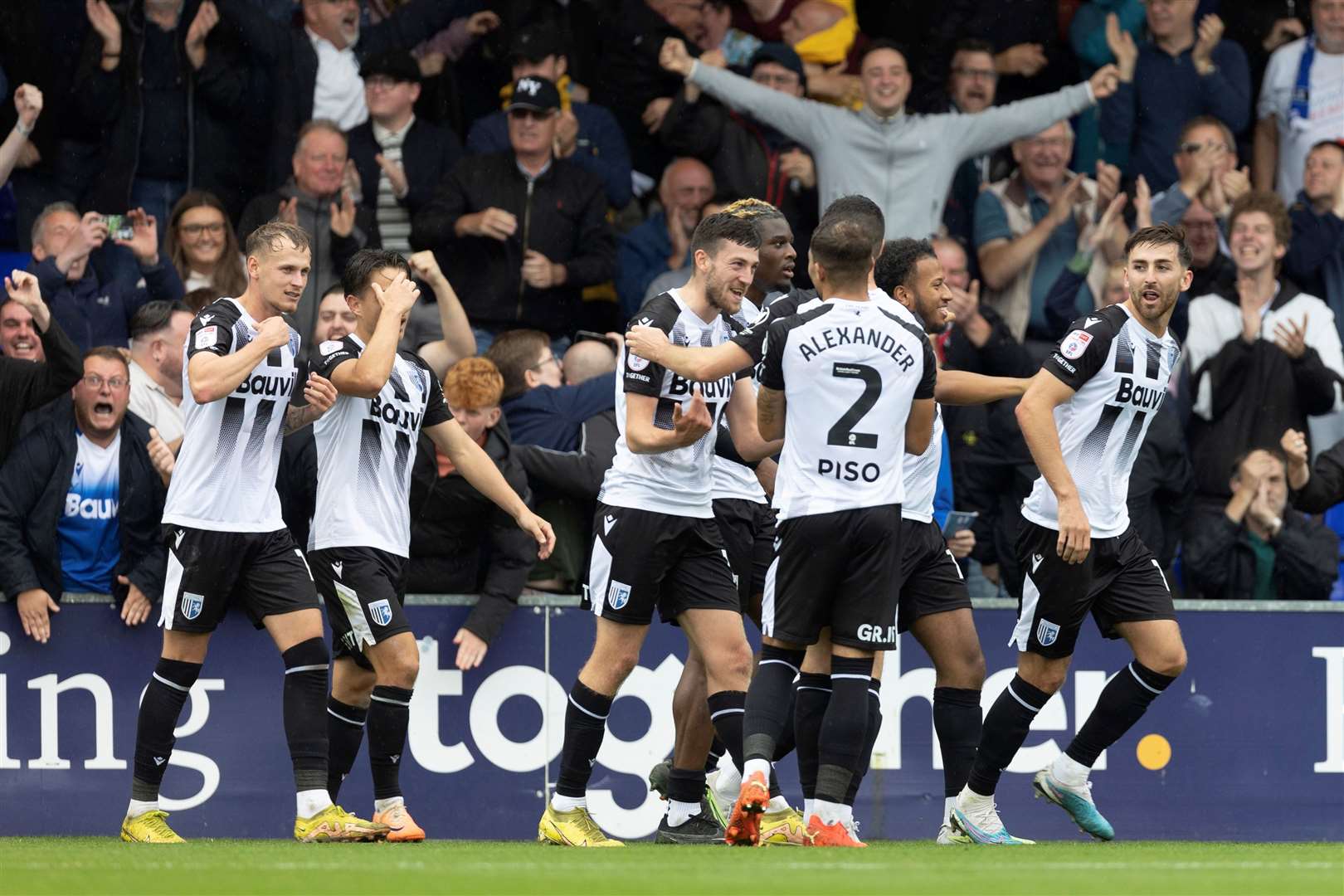 Gillingham celebrate their winning goal at Stockport on Saturday Picture: @Julian_KPI