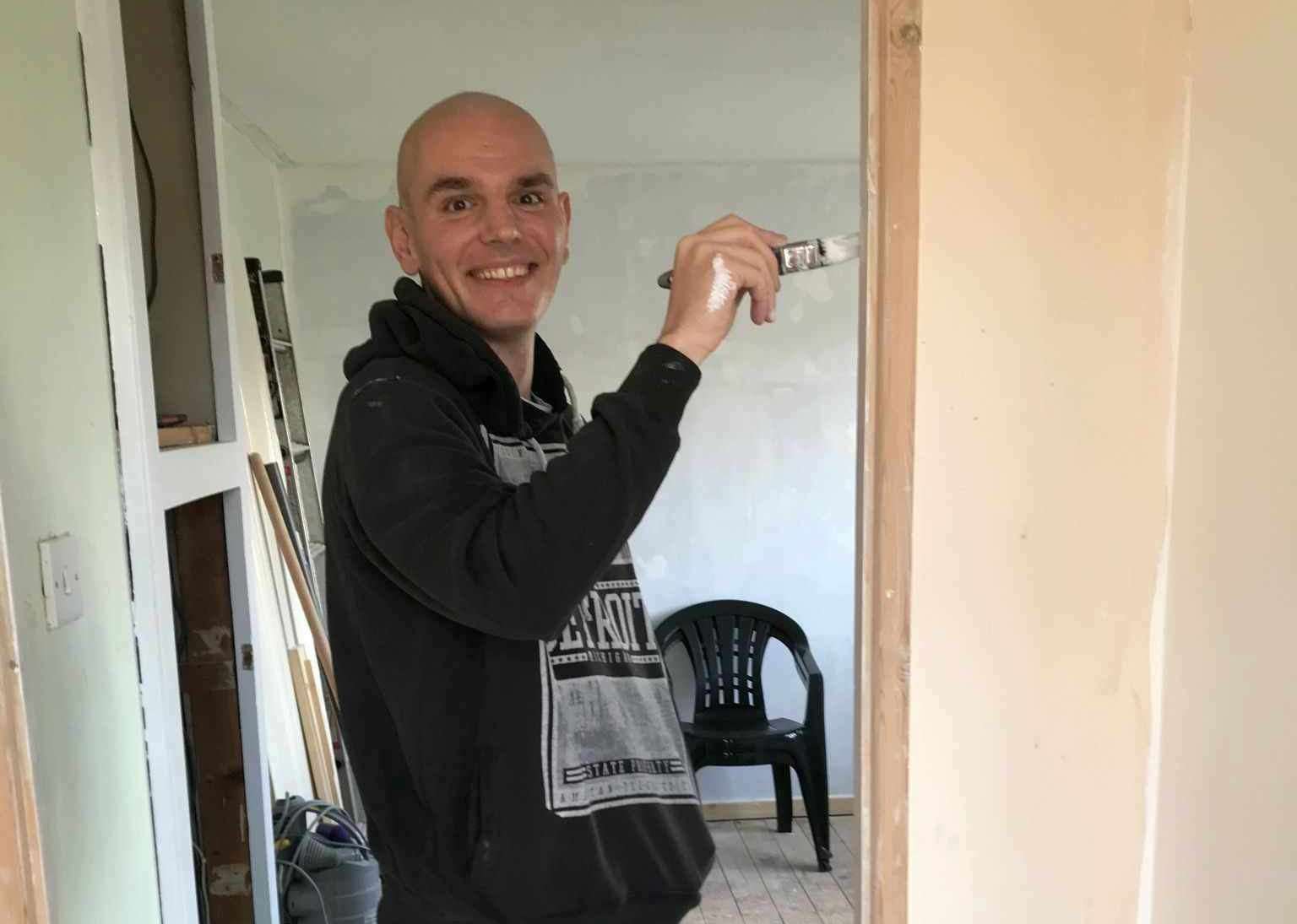 Ricky helping decorate his house after his first round of treatment. Picture: Ricky Kennedy