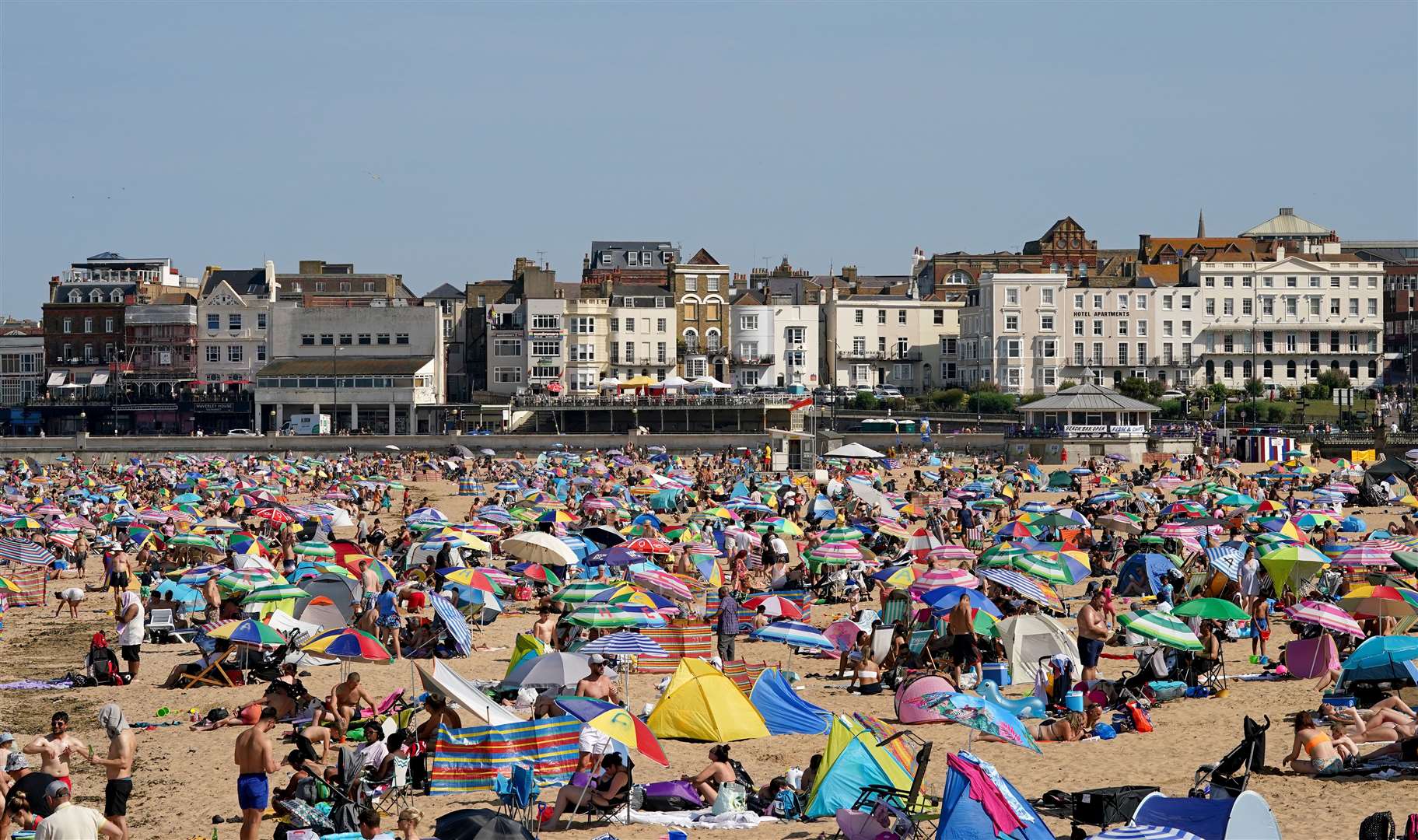 Sunseekers heading to the beach to bask in the sunny weather should use at least SPF factor 30 sunscreen in order to avoid sunburn, it was advised (Gareth Fuller/PA)