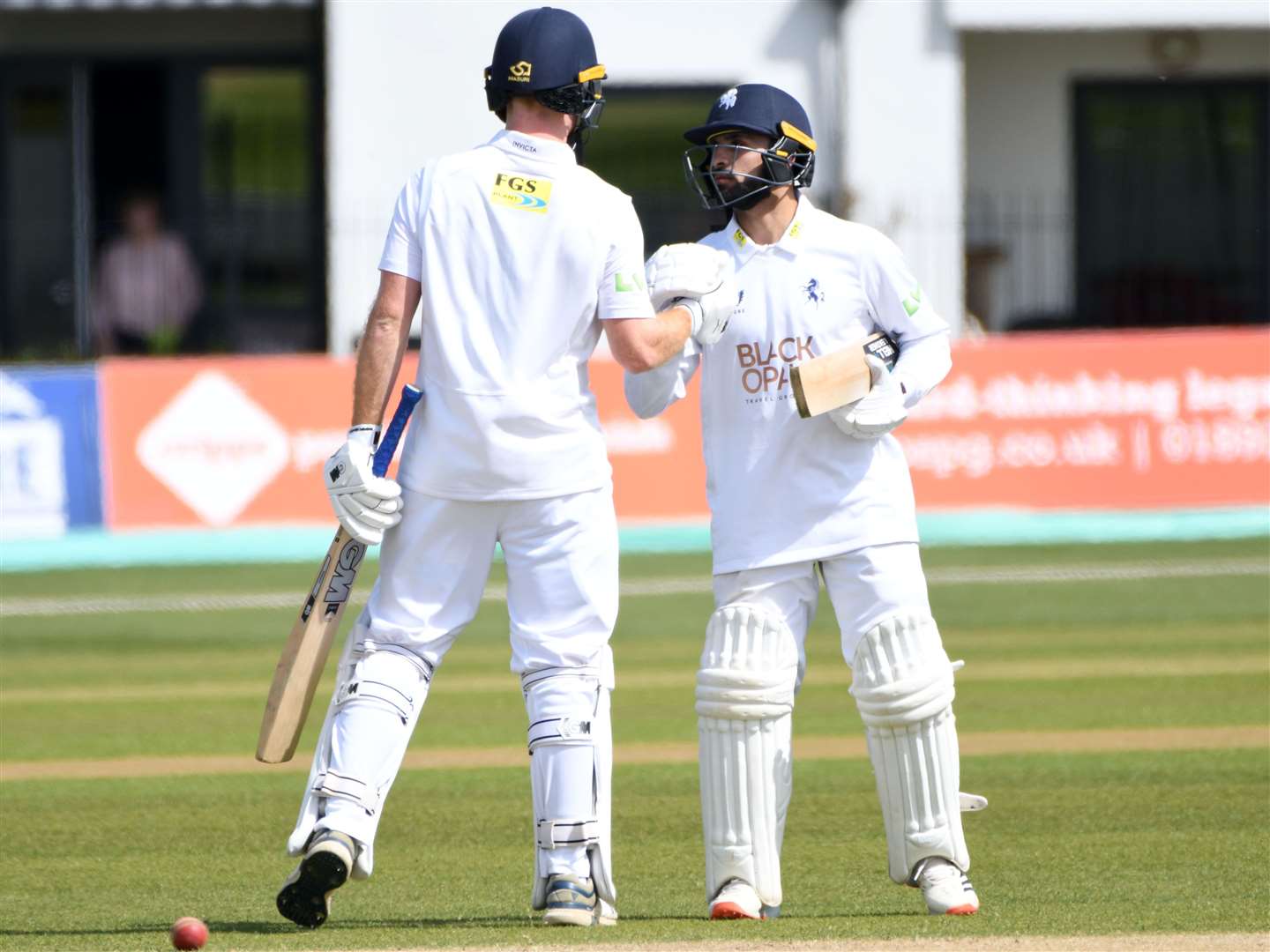 Compton congratulates Hamidullah Qadri on reaching his 50. Picture: Barry Goodwin