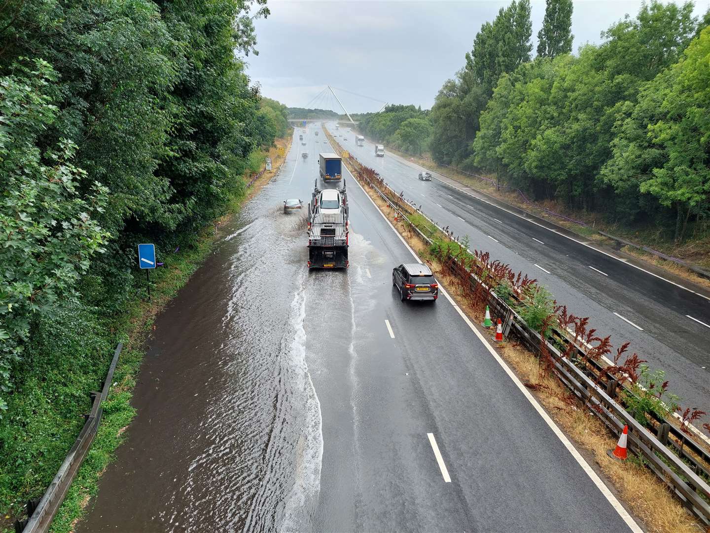 The M20 has partially flooded London-bound just before J9 in Ashford