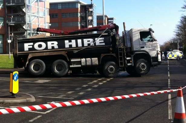 Lorry falls down sinkhole in Brompton