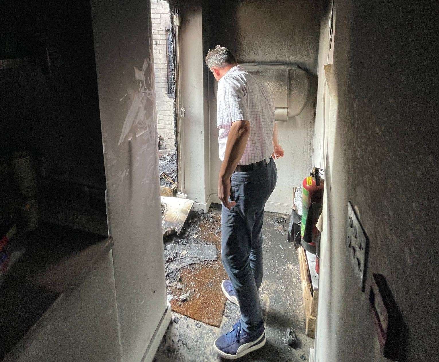 Owner Geoff Montague-Smith inspects the damage. Picture: Steve Morley