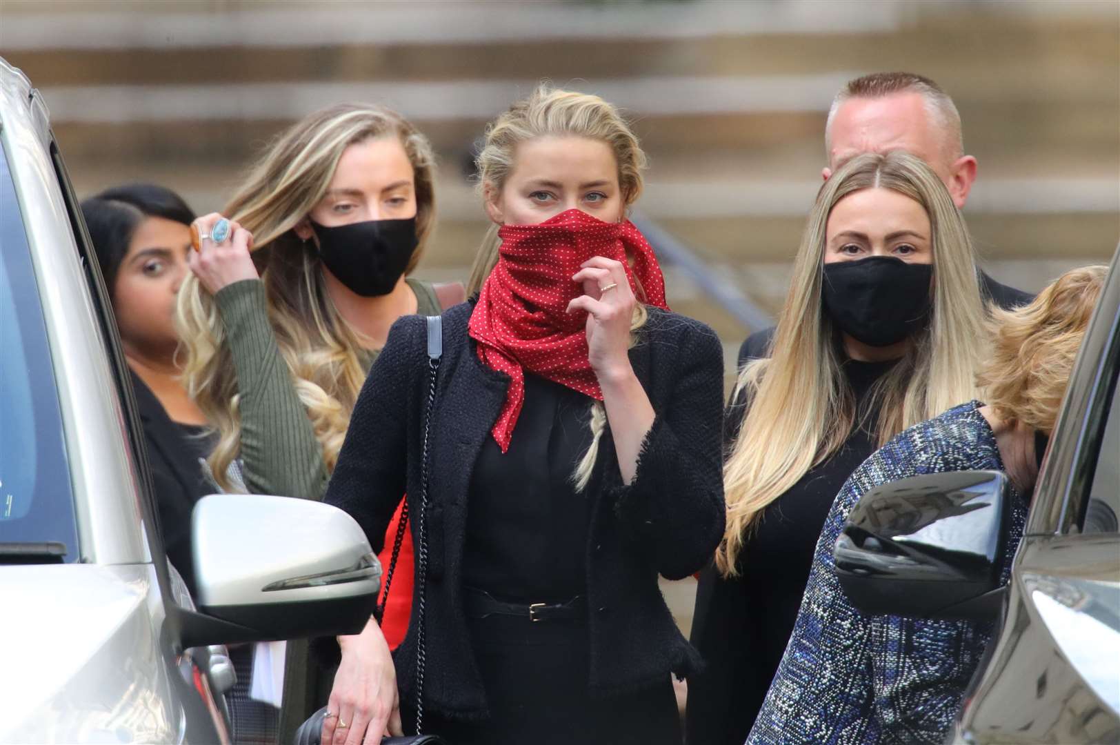 Amber Heard leaves the High Court (Aaron Chown/PA)